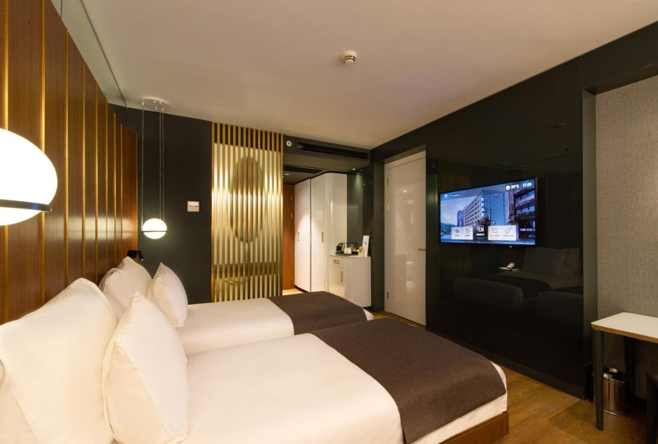 The Craton Hotel Sisli Istanbul Exterior foto A room at the hotel